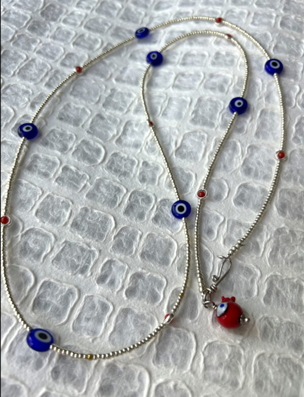 Silver Seed Bead Eye Bead Necklace with Coral Accents