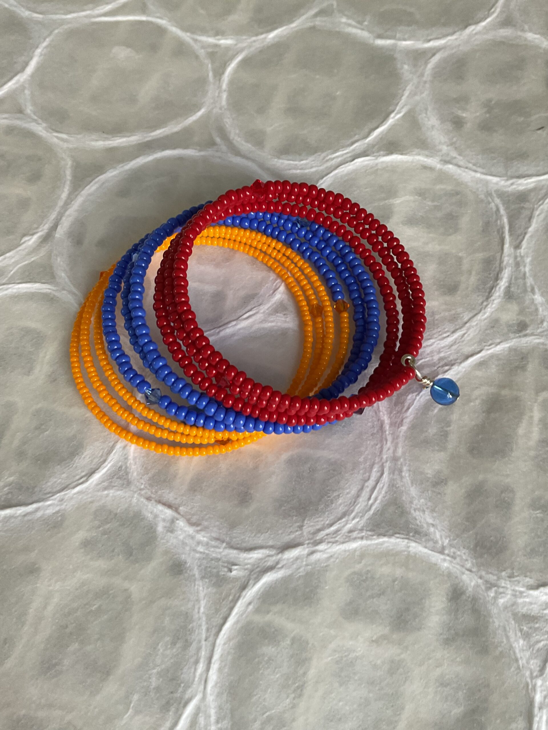 Red, Blue, Orange beaded spiral bracelet with Swarovski crystals - Image 4