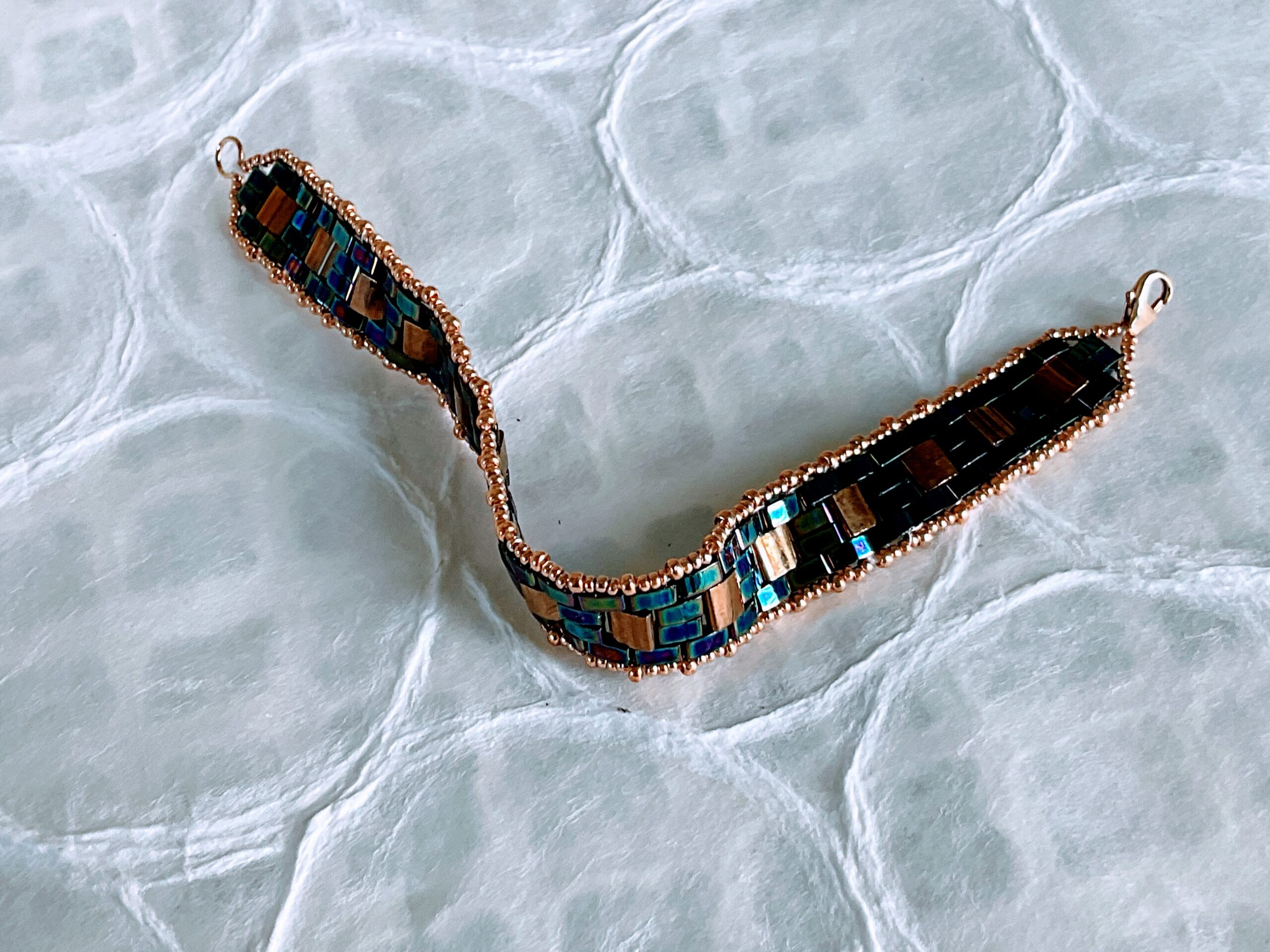 Iridescent blue/purple and gold flat woven TILA bead bracelet - Image 2